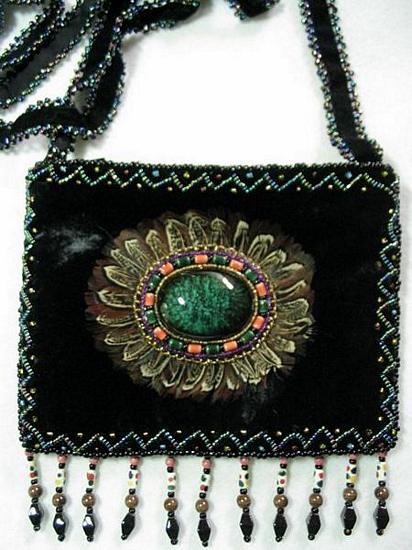 Black small purse w/ feather design 